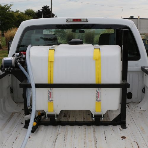 100 US Gallon Electric De-Icing Sprayer shown in the back of a pickup truck.