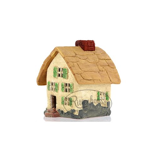 The Miniature Thatched Cottage has wonderful green shutters and a red chimney.